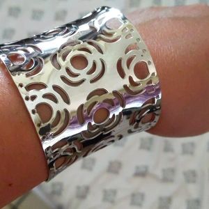 Silver color cuff with rose flower design, shiny, minimal scratch